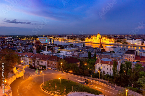 Landscape view of Budapest city in the evening, the Hungarian parliament building and otherr buildings along Danube river, Hungary.