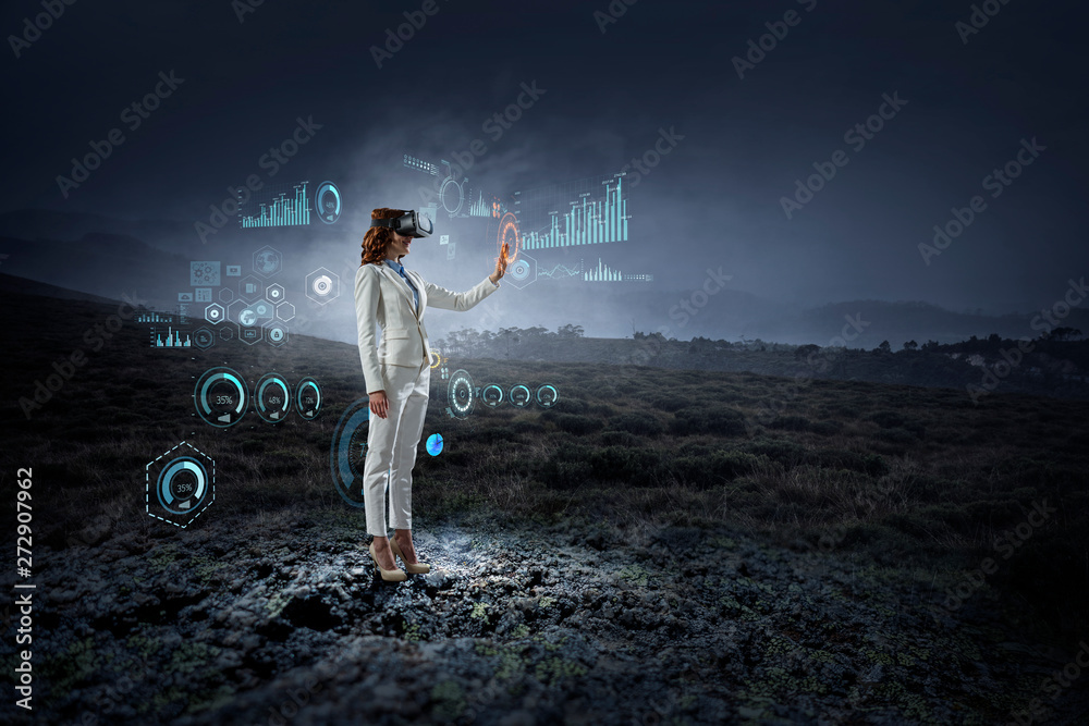 Young female in virtual reality. Mixed media Young female in virtual reality. Mixed media