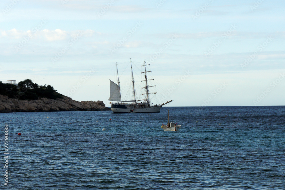 The three-masted sailboat stopped for the night in the bay of Sant Miquel.Ibiza Island.Spain.