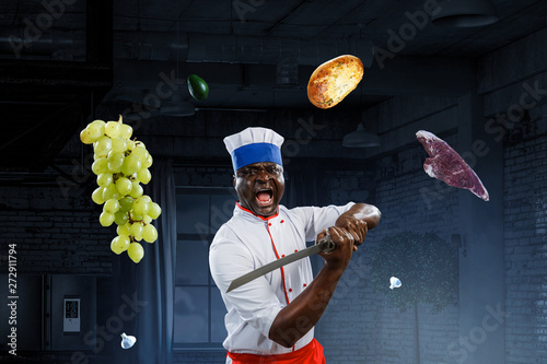 Black chef creative cooking. Mixed media. photo