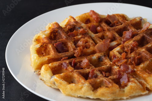 cheese belgian waffles with bacon close up