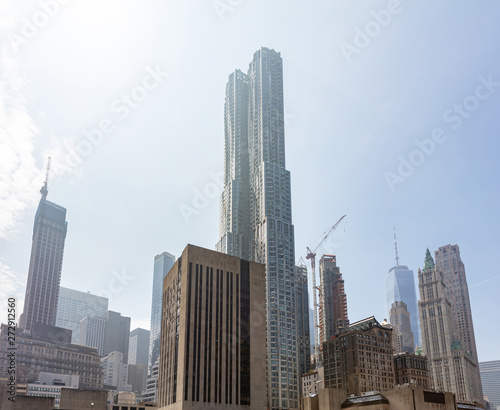 Aerial view of Manhattan skyscrapers, New York city, spring day sky background