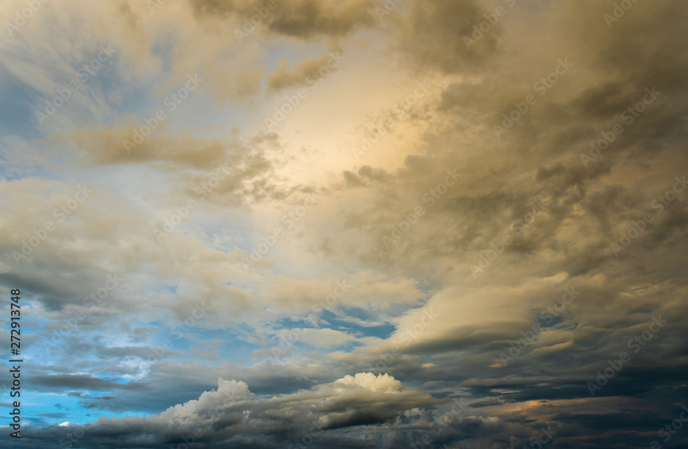 colorful dramatic sky with cloud at sunset.