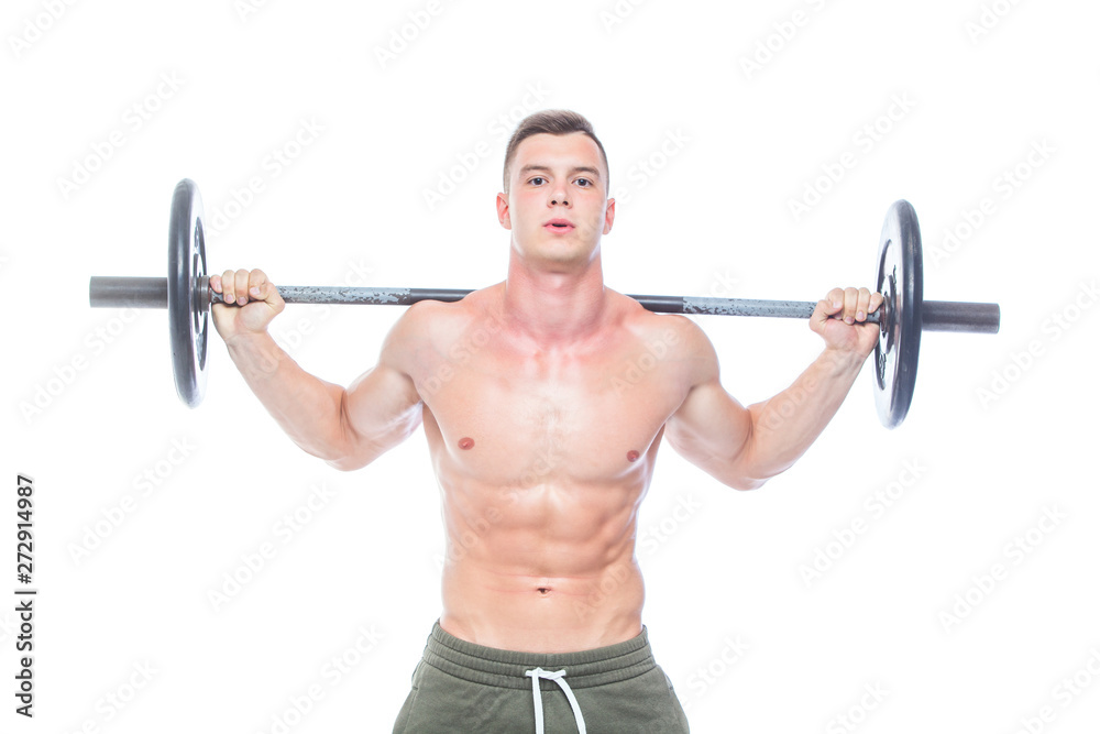 Muscular man working out in studio doing exercises with barbell at biceps, strong male naked torso abs. Isolated on white background. Copy Space. Muscular man working out in studio doing exercises with barbell at biceps, strong male naked torso abs. Isolated on white background. Copy Space.
