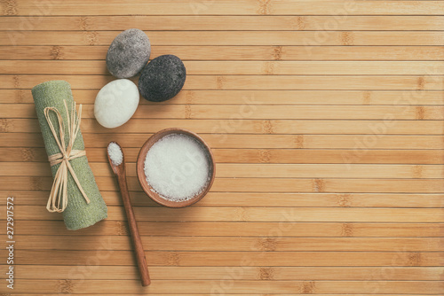 Canvas Print Bath salts natural spa products top view on bamboo wooden texture background with copy space for wellness health concepts