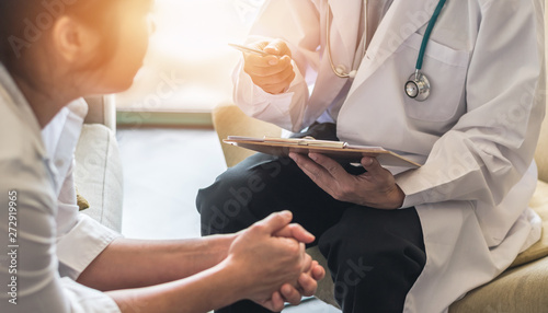 Photos Woman patient with doctor or psychiatrist consulting and diagnostic examining on