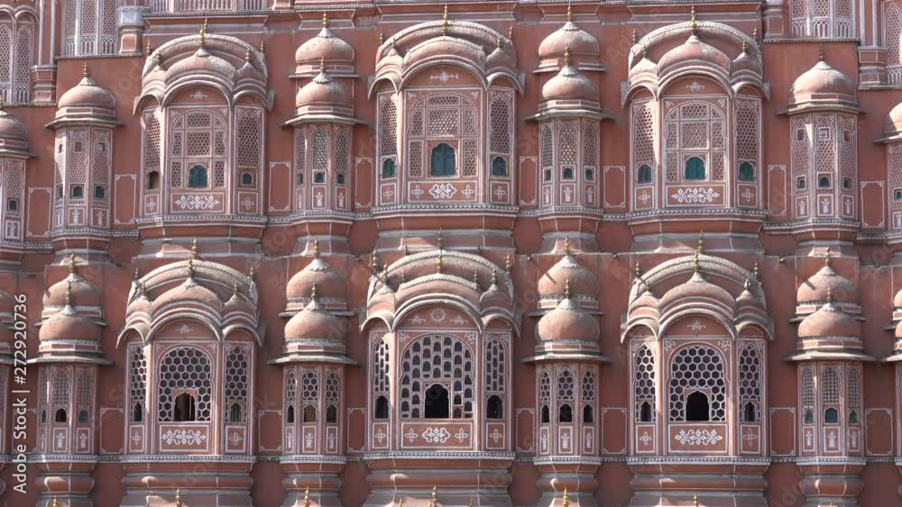 Hawa Mahal, pink palace of winds in old city Jaipur, Rajasthan, India, establishing shot. Background of indian architecture, close up Hawa Mahal, pink palace of winds in old city Jaipur, Rajasthan, India, establishing shot. Background of indian architecture, close up