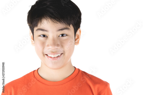 Photo of asian young happy boy looking at camera