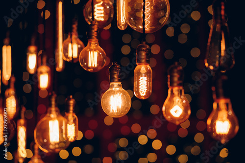 Set edison retro lamp on dark bokeh background