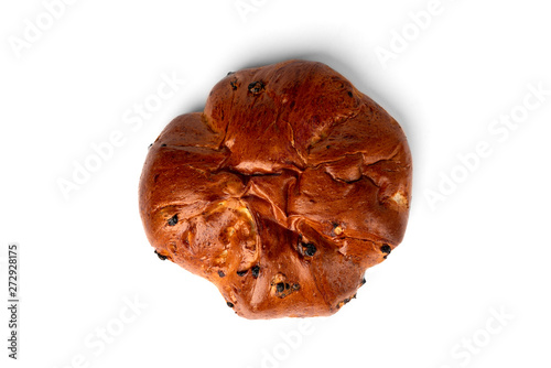 Bun with raisins isolated on white background.