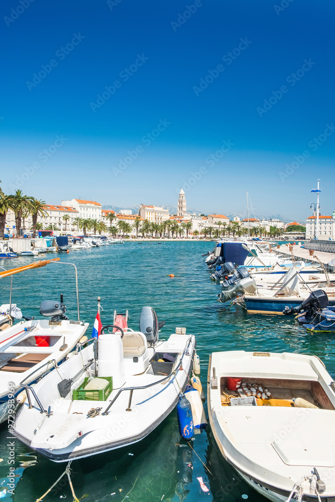 City center, cathedral tower, boats and yachts in marina of Split, Croatia, largest city of the region of Dalmatia and popular touristic destination, beautiful seascape