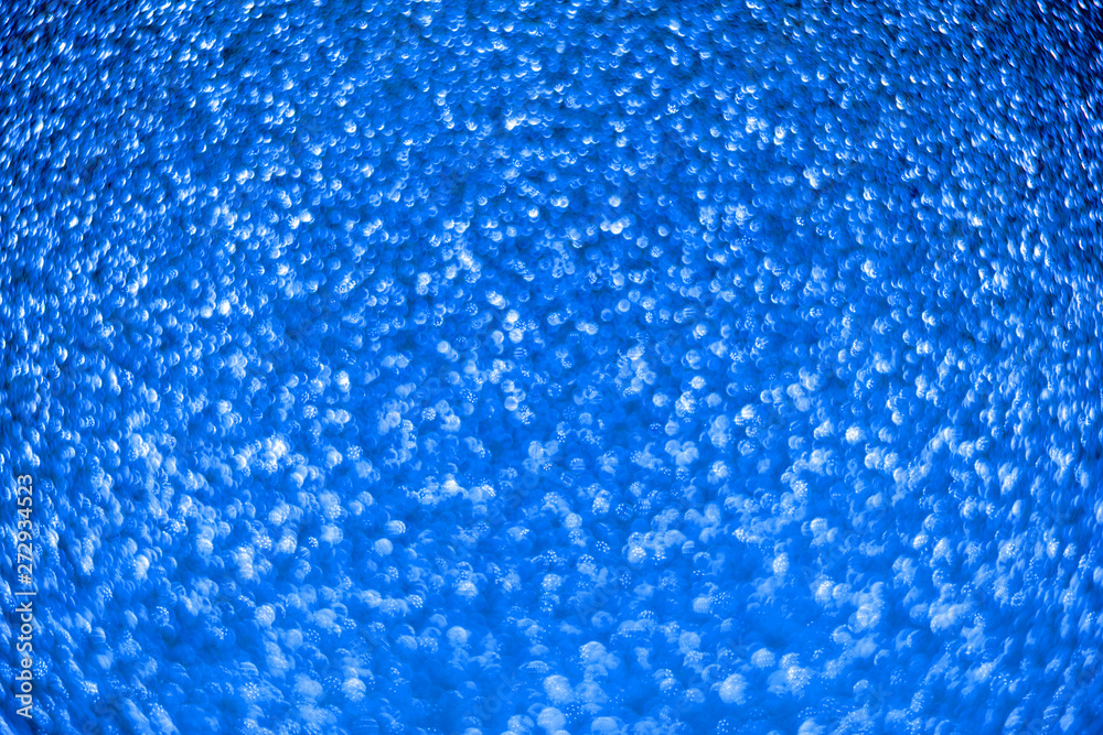 Bright sparkle blue background. Holiday and festive concept. Bright sparkle blue background. Holiday and festive concept.