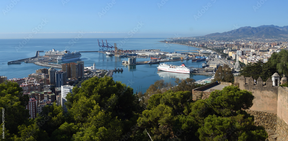 Panorama of the dock with cruise liners  and  town  Malaga in Andalucia Spain.