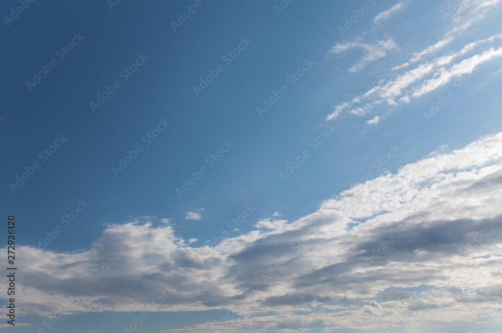 Obraz premium fluffy clouds on a sunny sky