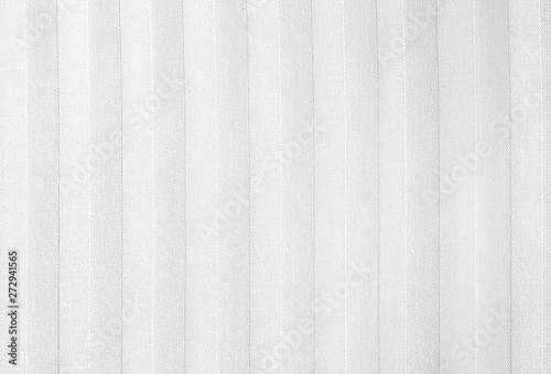 White cotton fabric structure with stripes. Stripe textured cotton fabric background.