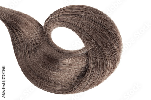 Brown hair isolated on white background. Long wavy ponytail