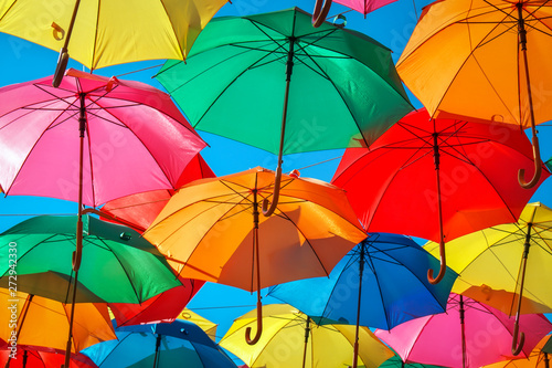 Colorful umbrellas in the sky as background. Street decoration.  