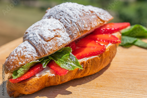 Sweet croissant with Strawberry and mint, Fresh morning breakfast