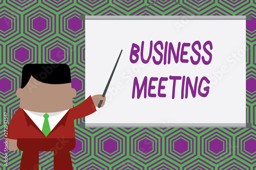 Conceptual hand writing showing Business Meeting. Concept meaning used discuss issues that cannot be addressed in simple way Businessman standing in front projector pointing project idea © Artur