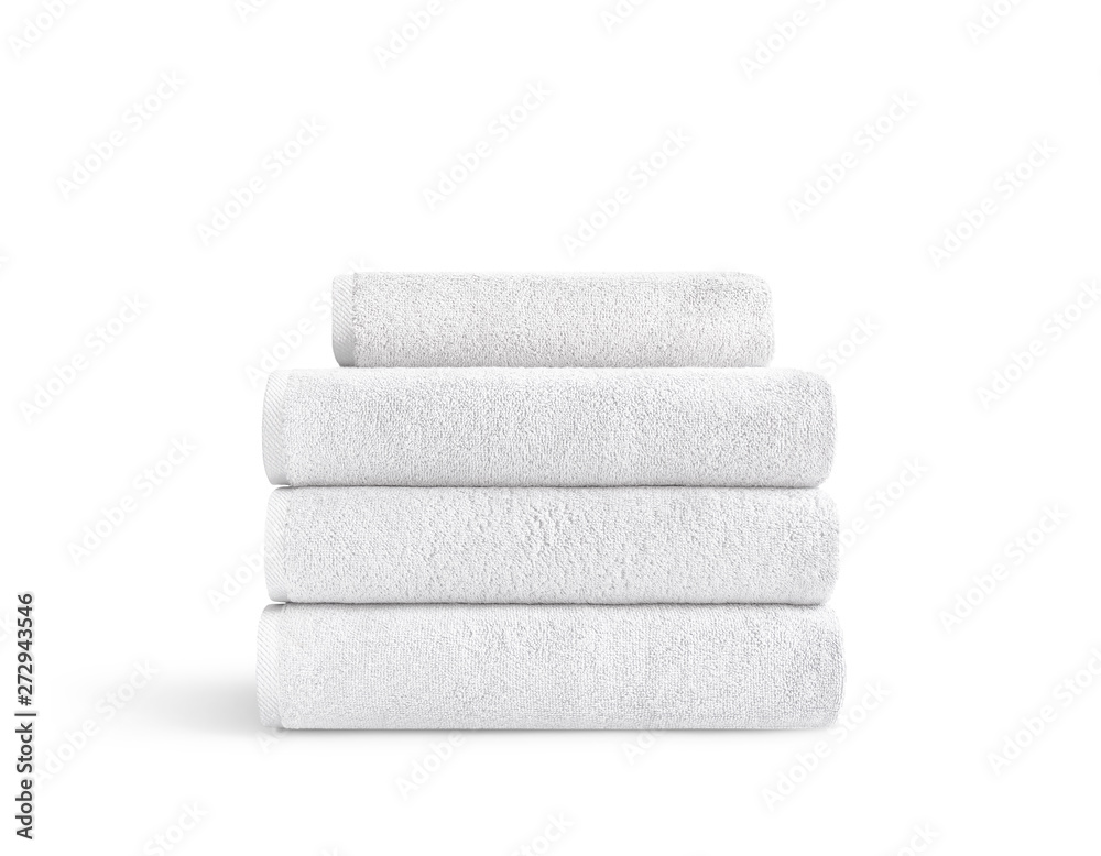 Stack of white cotton towels on a white background