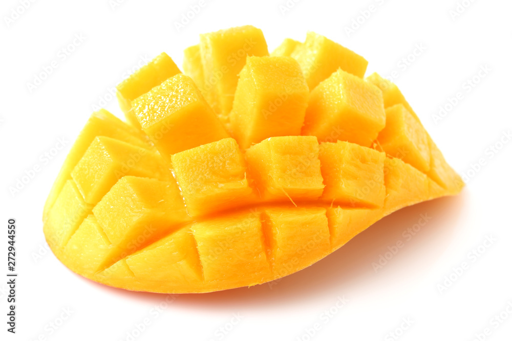 Mango slice cut to cubes close-up isolated on white background Mango slice cut to cubes close-up isolated on white background