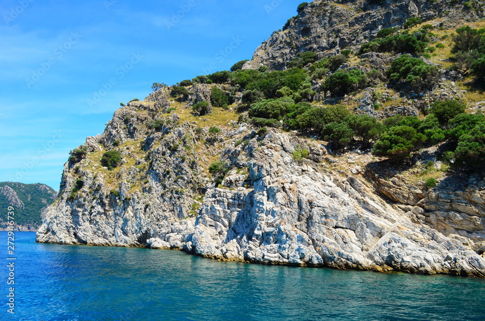 amazing clear waters of the Aegean Sea and the rocks