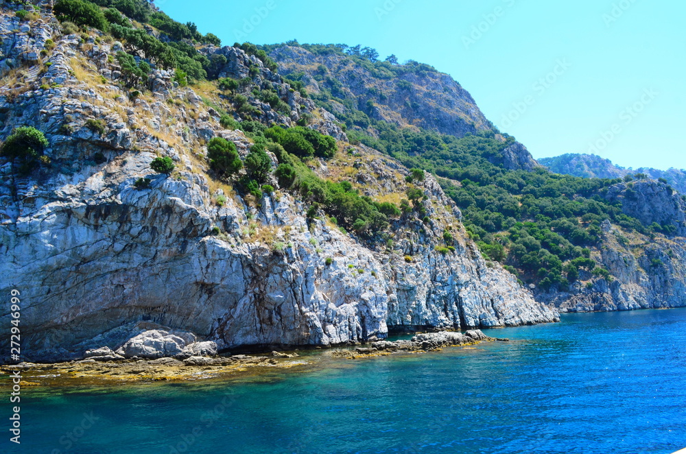 amazing clear waters of the Aegean Sea and the rocks