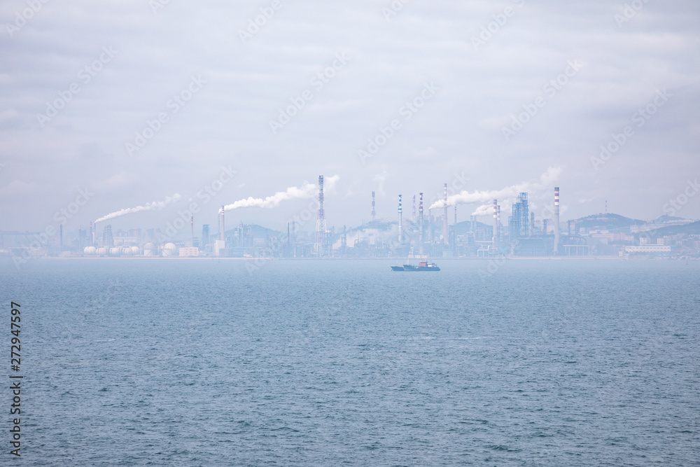 China's Dalian Chemical Plant in the smog