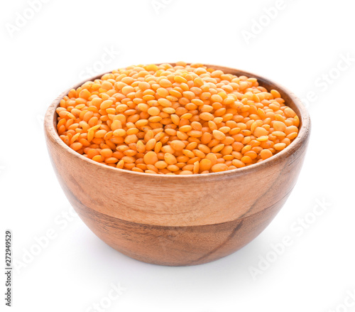Raw lentils on white background