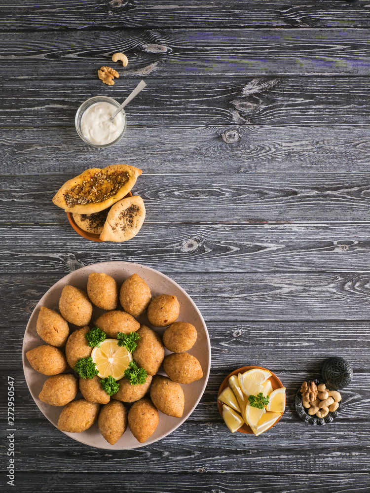 Traditional Arabic kibbeh with lamb and pine nuts.