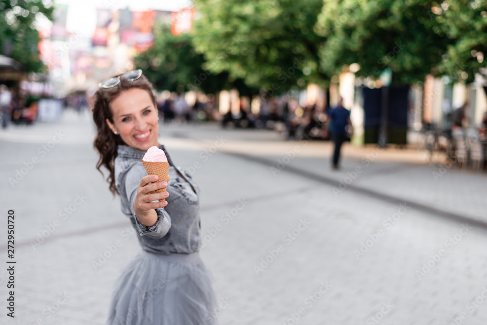 Woman with icecream, shallow focus