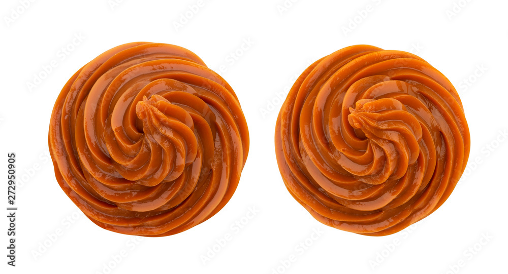 Swirl of caramel cream isolated on white background, top view Swirl of caramel cream isolated on white background, top view