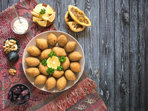 Arabic meat appetizer Kibbeh. Traditional Arabic kibbeh with lamb and pine nuts