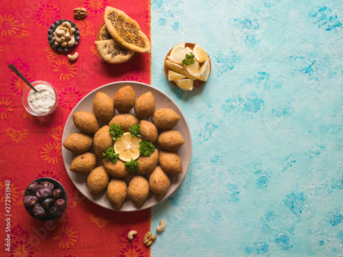 Traditional Arabic kibbeh with lamb and pine nuts.