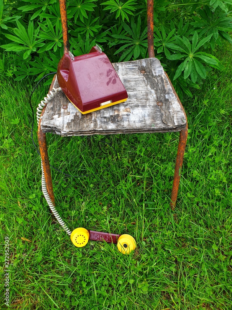 old telephone with speaking tube on the wire, old telephone in nature ...