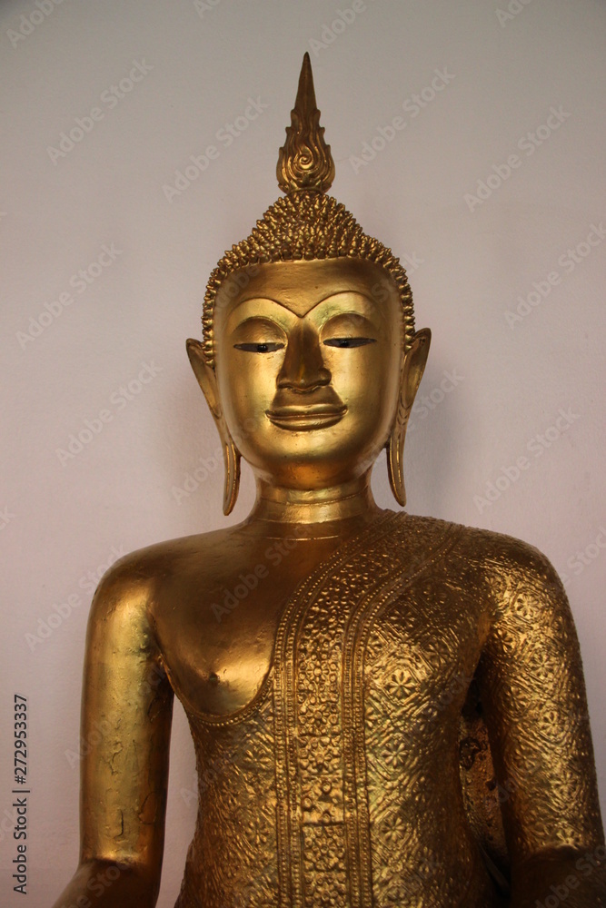 Happiness  And Smiles Face Golden Buddha In Buddhist Temple In Bangkok Thailand