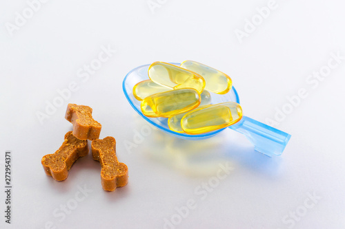 omega oil capsules for animals with treats like bones