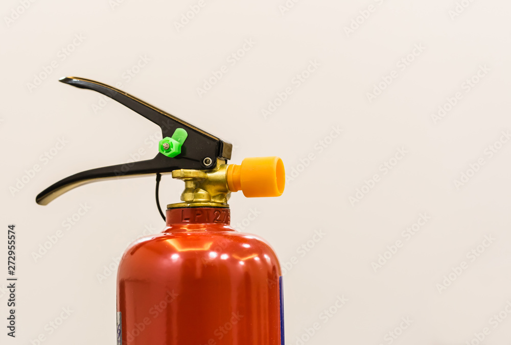 Fire extinguisher isolated closeup view on white background Fire extinguisher isolated closeup view on white background