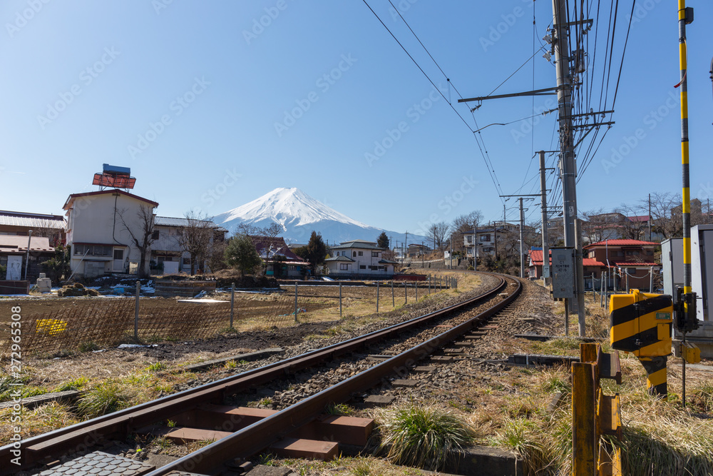 Train railway pass through Fujiyoshida city and Fuji mountain view