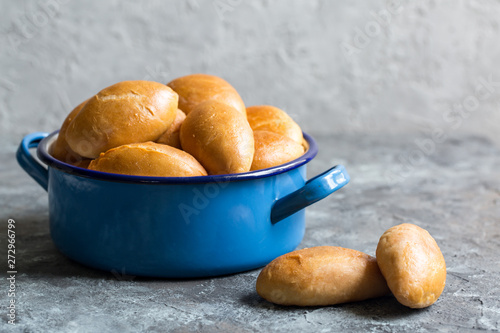 Piroshki - russian baked puff pastry with cabbage fillings. photo