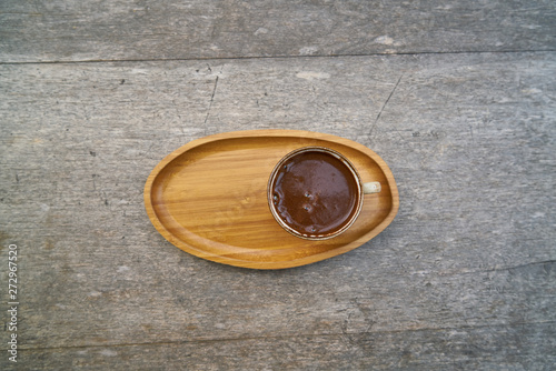 Delicious Turkish coffee on wooden dish