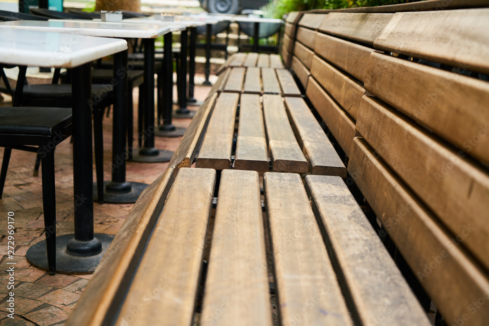 Wooden benches of a cafe