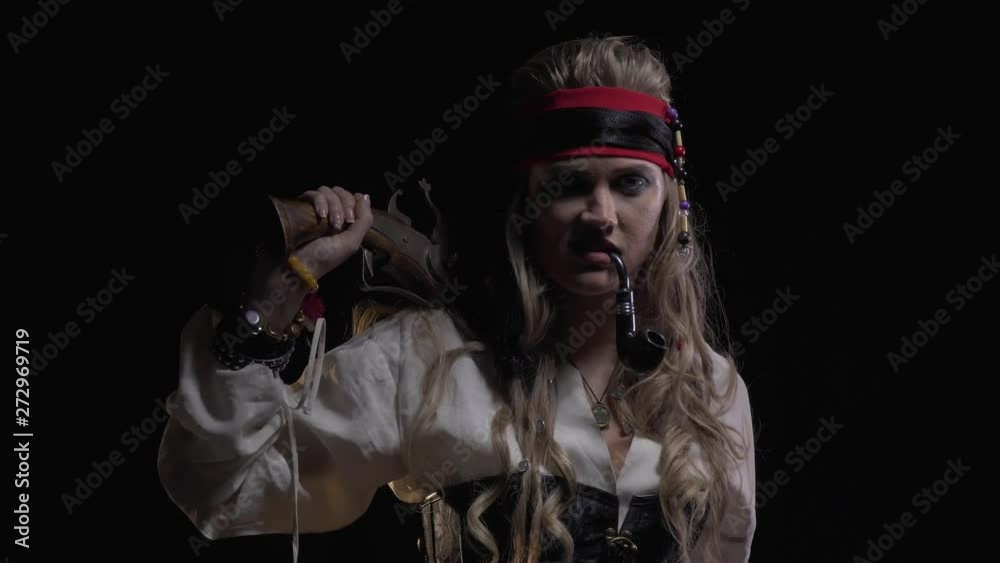 Close up of a young blonde woman pirate with a pistol and smoking pipe, 4k