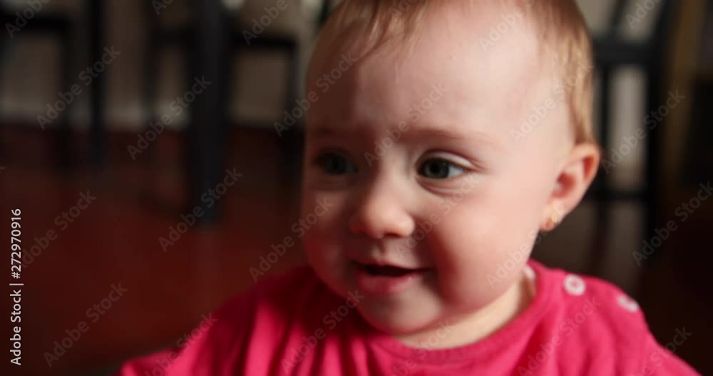 Cute little baby cries and puts a finger in the mouth, shot in slow motion Cute little baby cries and puts a finger in the mouth, shot in slow motion