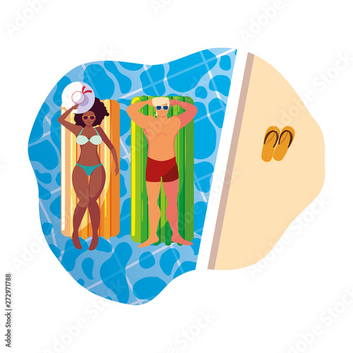 interracial couple with float mattress in water