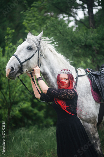 Girl with a white horse