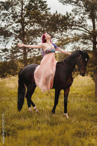 Girl on a black horse