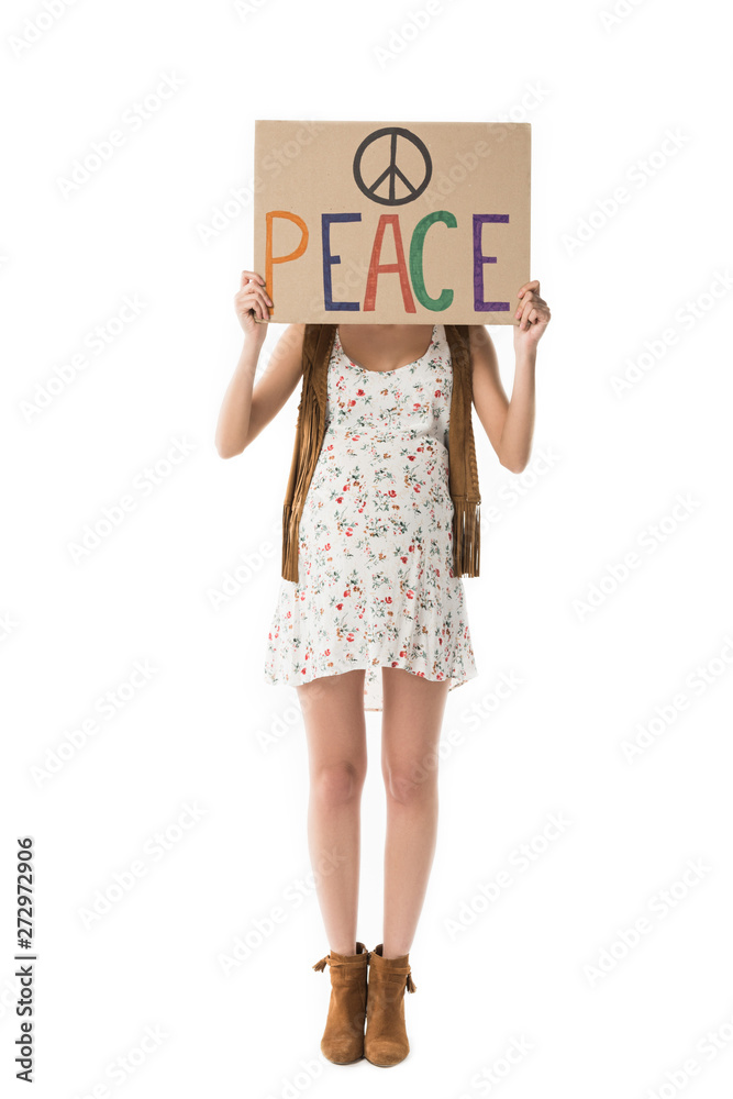 Naklejka premium full length view of pregnant hippie woman holding placard with inscription isolated on white