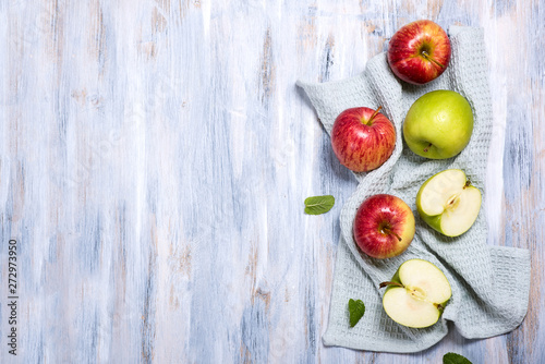 Fresh red and green apples, top view copy space background