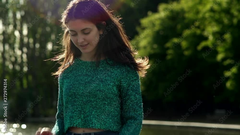 Gorgeous Italian fashion model posing in her outfit in a park in London at golden hour. Fashion and beauty concept Gorgeous Italian fashion model posing in her outfit in a park in London at golden hour. Fashion and beauty concept